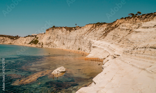 Panoramic sunset view of the Scala dei Turchi limestone cliffs in Realmonte, Sicily, Italy
