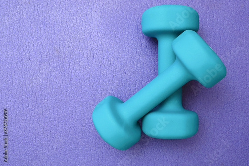 fitness at home, two dumbbells, closeup