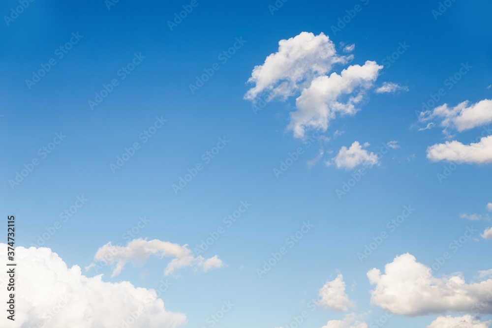 Clear blue sky and beautiful small white clouds Clear blue sky and beautiful small white clouds