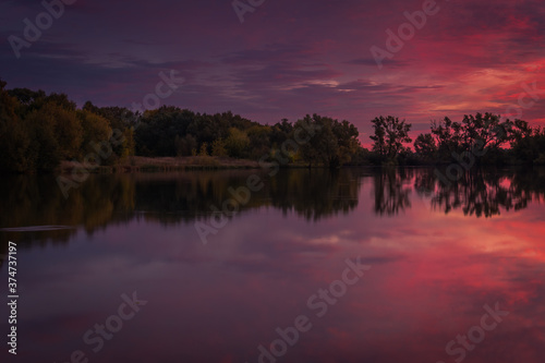 sunset over the lake © Evgenii Ryzhenkov