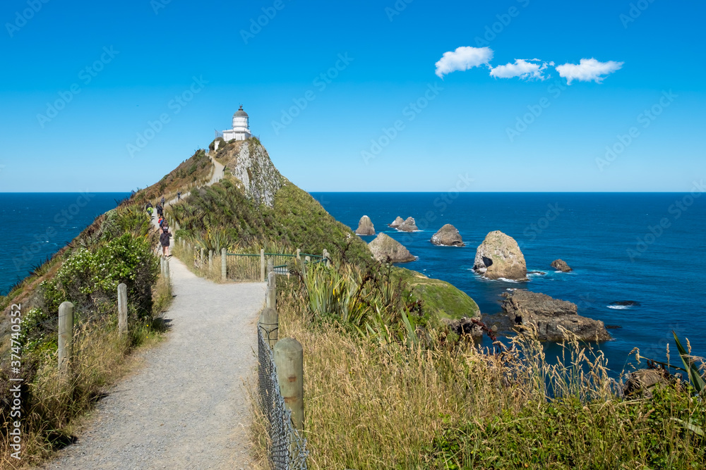 Φωτογραφία Lighthouse of Nugget Point on the South Island of New Zealand.
