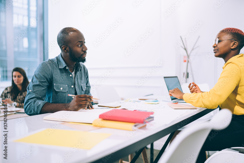 Fototapeta premium Focused partners during business conversation in office