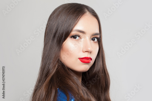 Portrait of brunette model woman on white background