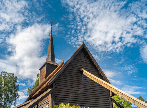 The stunning Rodven Stave Church (stavkyrkje), More og Romsdal county, Norway. The brown, wooden church was built in a long church style during the 12th century by an unknown architect. photo