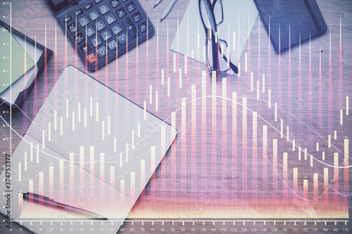 Double exposure of forex graph drawing and work table top veiw. Concept of financial analysis. © peshkova