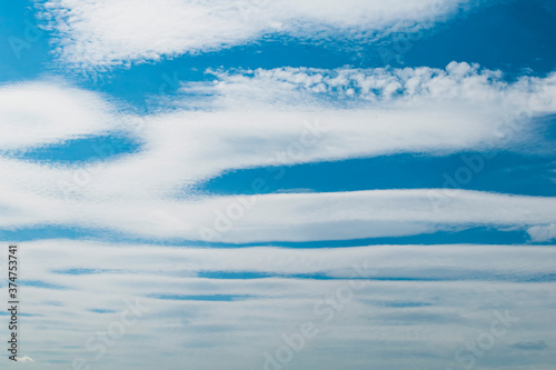 Fototapeta Naklejka Na Ścianę i Meble -  White clouds in a blue Sunny sky