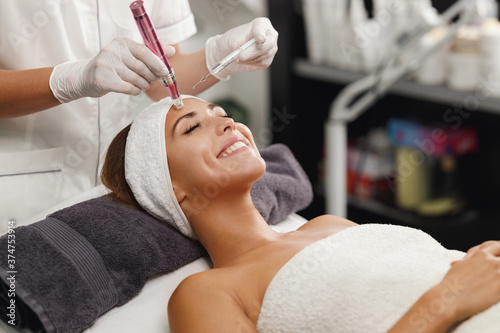 Dermapen Micro-needling Treatment In A Beauty Salon photo