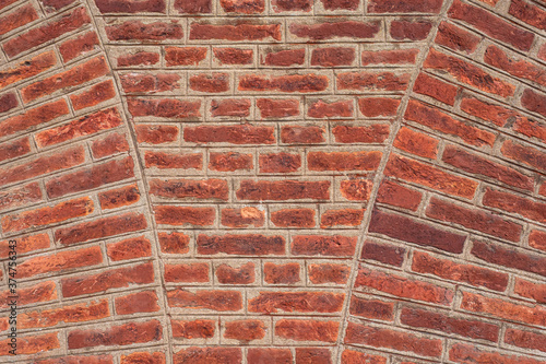 Red brick background. Three...