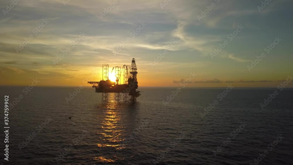 Aerial view from a drone of an offshore jack up rig at the offshore location during sunrise time
Aerial view from a drone of an offshore jack up rig at the offshore location during sunrise time