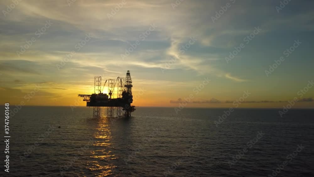 Aerial view from a drone of an offshore jack up rig at the offshore location during sunrise time
Aerial view from a drone of an offshore jack up rig at the offshore location during sunrise time