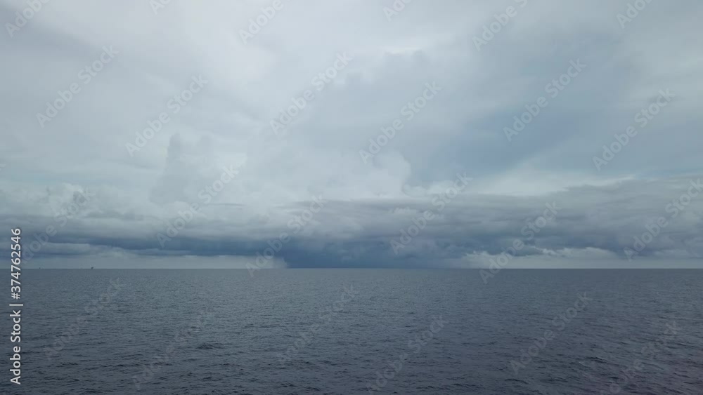 Stormy clouds over dark ocean ready for raining
Stormy clouds over dark ocean ready for raining
