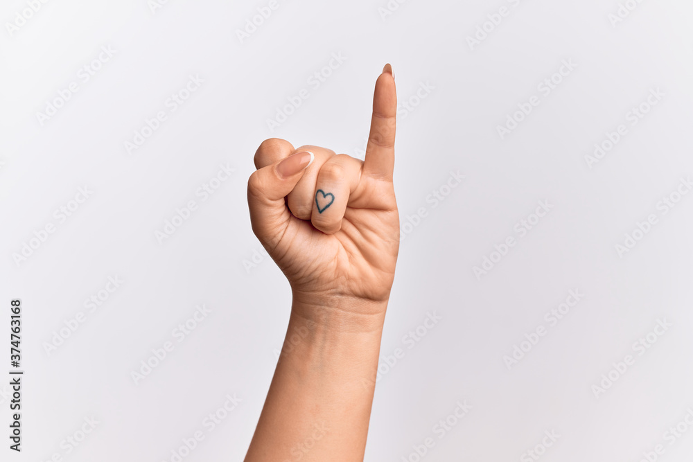 Hand of caucasian young woman showing little finger as pinky promise commitment, number one Hand of caucasian young woman showing little finger as pinky promise commitment, number one
