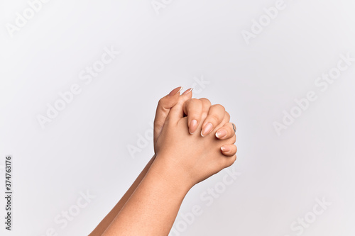 Hand of caucasian young woman praying with hands clasped, fold fingers religious gesture