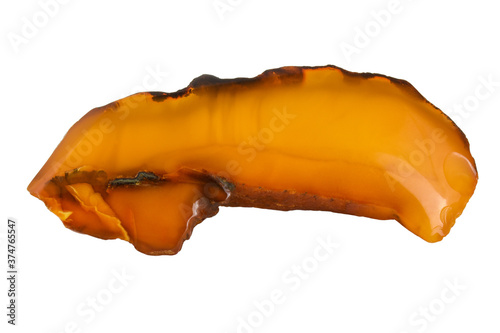 Close-up view of beautiful piece of natural amber isolated on white background, macro photo