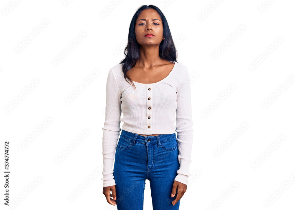 Obraz premium Young indian girl wearing casual clothes skeptic and nervous, frowning upset because of problem. negative person.