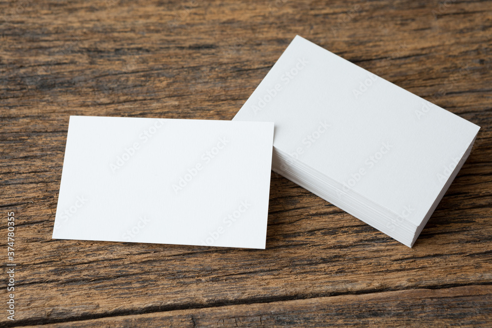 Stack of Business card on wood background and copy space Stack of Business card on wood background and copy space