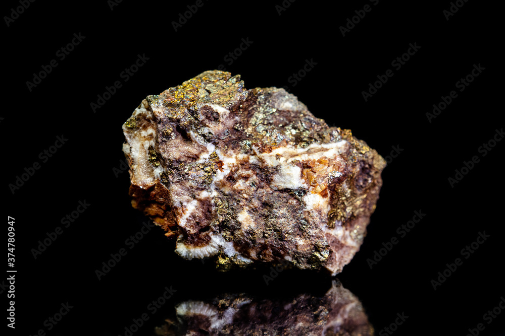 Chalcopyrite copper ore, raw rock on black background, mining and geology Chalcopyrite copper ore, raw rock on black background, mining and geology