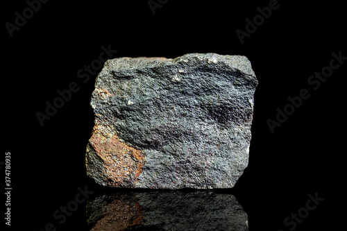 Chamosite ore, raw rock on black background, mining and geology