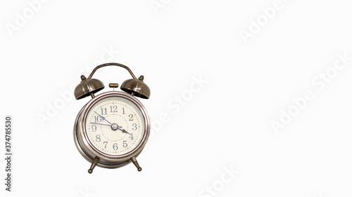 Classic brass table clock isolated on white background