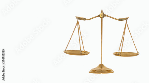 Golden brass scales made with white background Sign of justice attorney concept