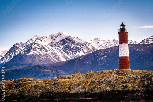 red lighthouse in the mountains