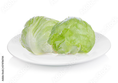 Fresh  lettuce isolated on white plate