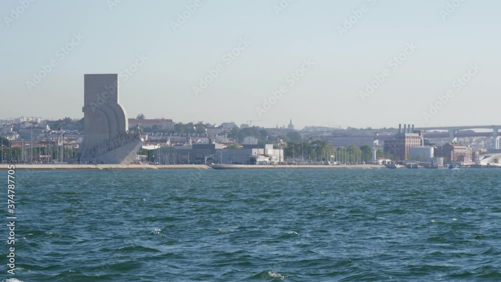 Monument to the discoveries view from boat Lisbon Portugal slow motion 4k