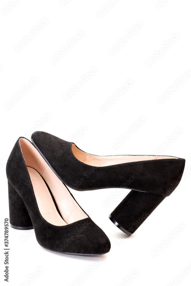 Women's black shoes with heels on a white background Women's black shoes with heels on a white background