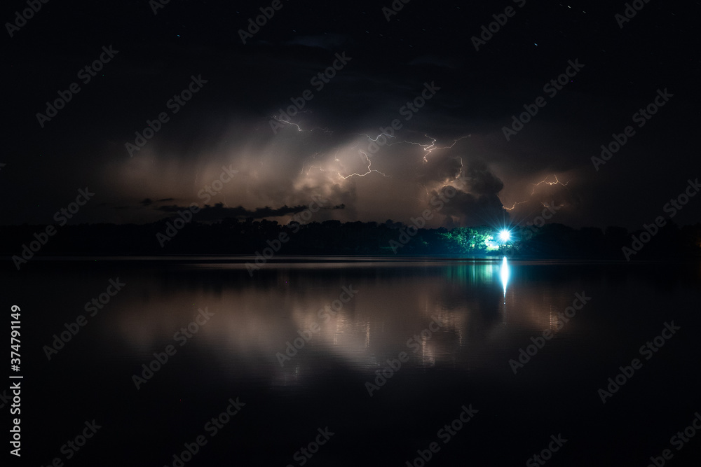Lighting from thunderstorm over Lake Herman