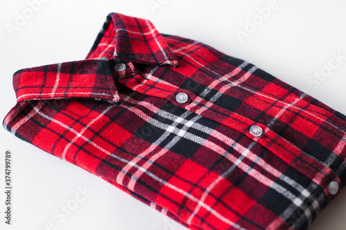 red plaid shirt on white bachground