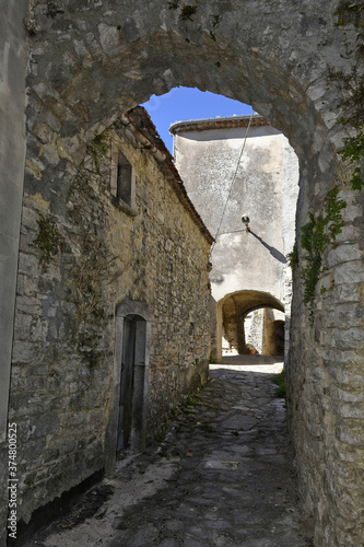A narrow street among the old houses of Cercemaggiore  a medieval village in the Molise region.