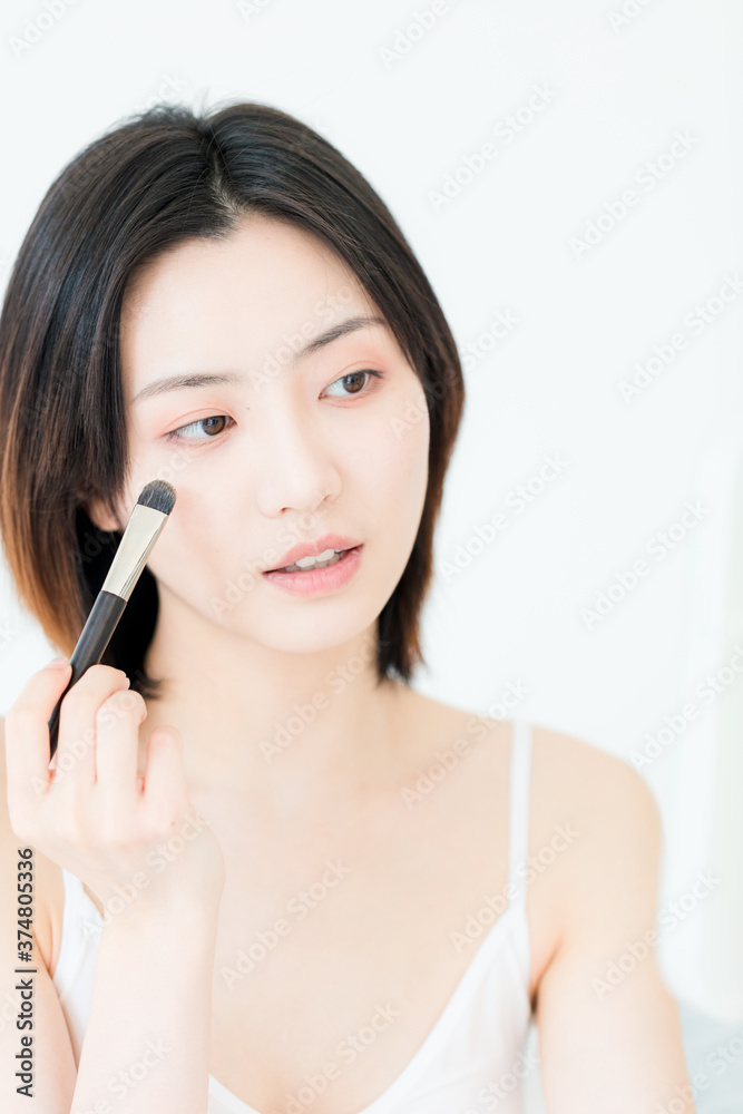 A beautiful young asian woman in make-up
A beautiful young asian woman in make-up