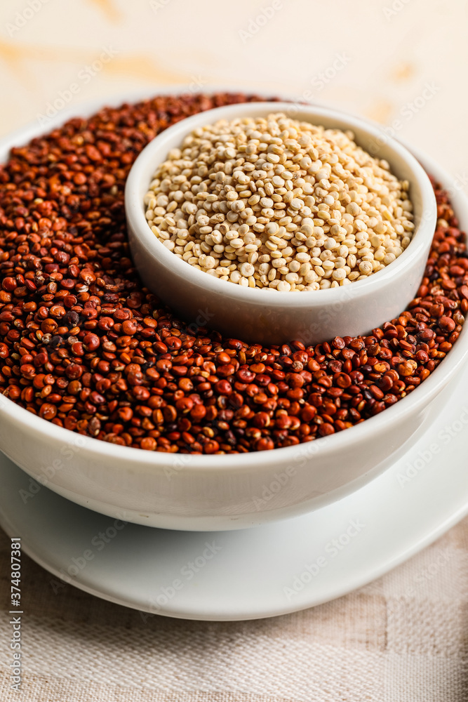 Bowls with healthy quinoa on table, closeup Bowls with healthy quinoa on table, closeup