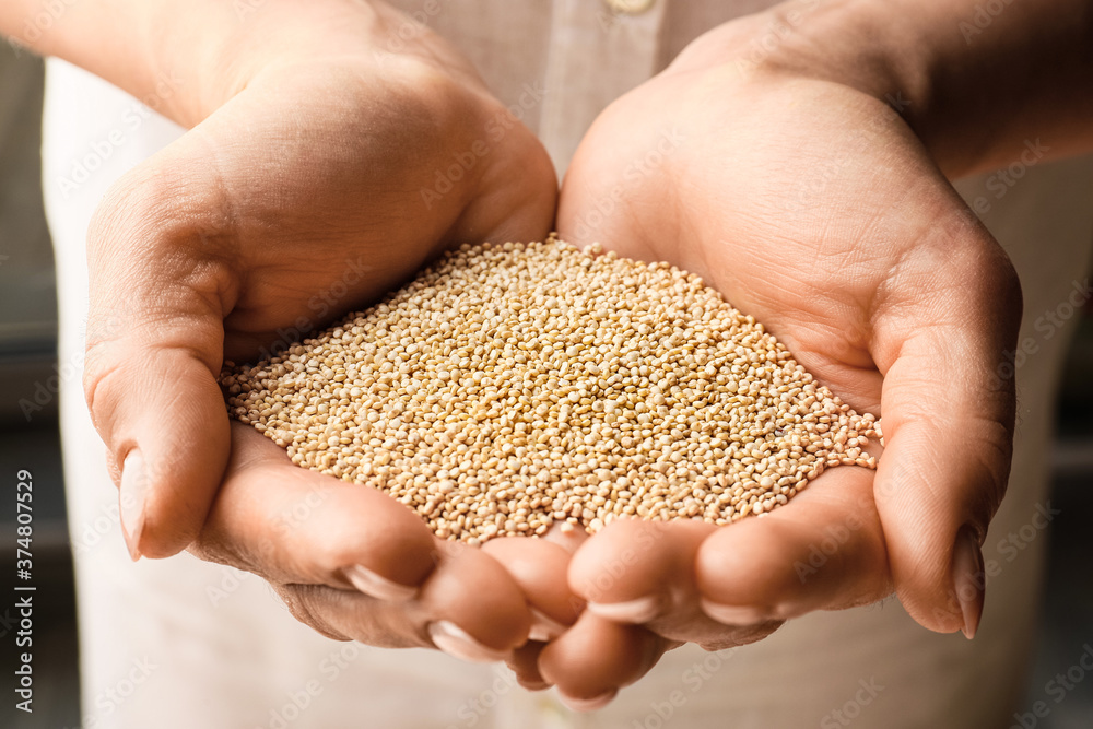 Woman with healthy quinoa, closeup Woman with healthy quinoa, closeup
