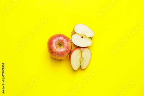 Fresh apples on color background