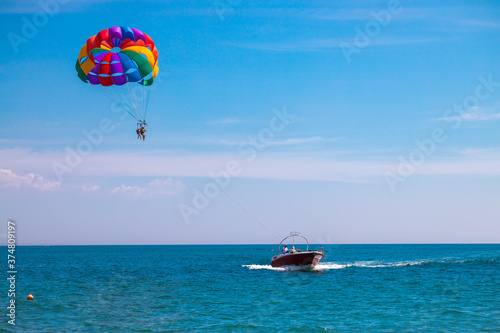 Parasailing boat ride. Extreme fun activity on the sea for people