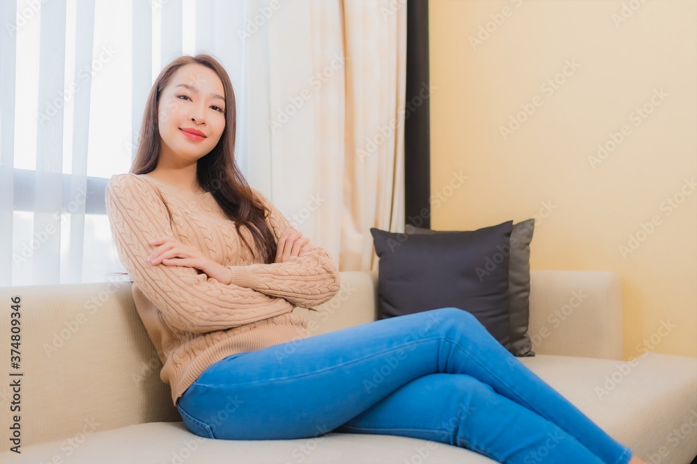 Portrait beautiful young asian woman relax smile happy on sofa Portrait beautiful young asian woman relax smile happy on sofa