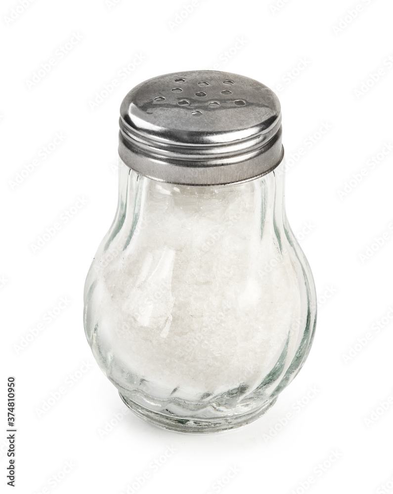 Salt shaker isolated on white background. Salt in glass bottle. Salt shaker isolated on white background. Salt in glass bottle.