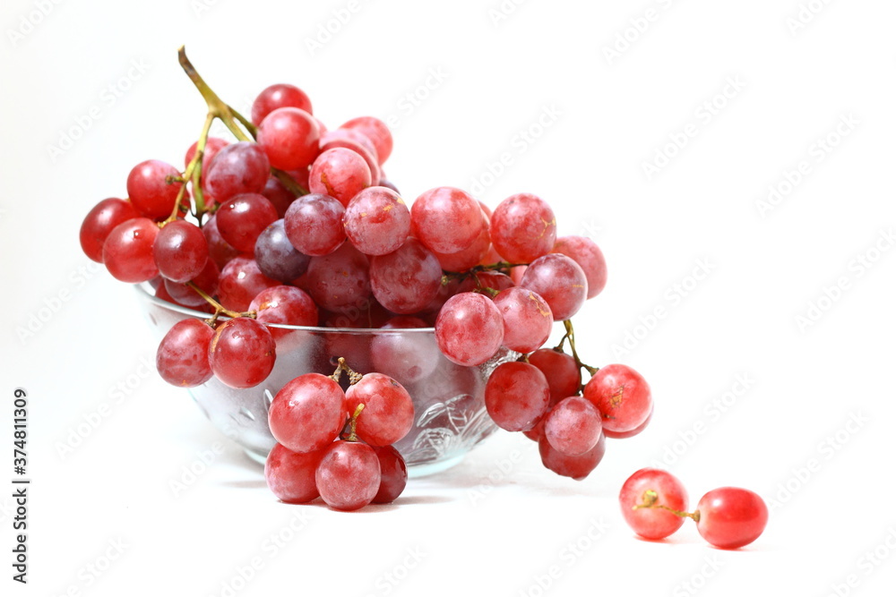 A bunch red grapes isolated on white background