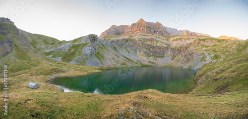 Panoramic view of the ibon of sabocos in the pyrenees  refuge by the lake