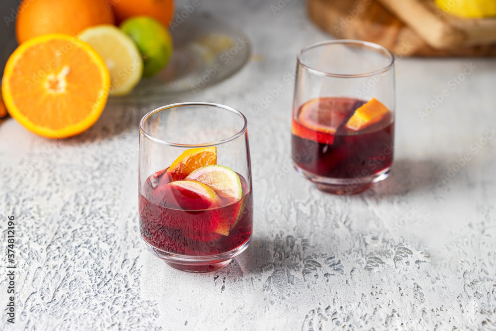Refreshment acholic drink sangria making with red wine, orange and other fruit. Famous Spanish summer beverage Refreshment acholic drink sangria making with red wine, orange and other fruit. Famous Spanish summer beverage