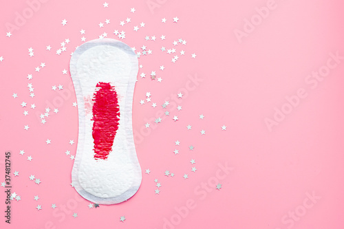 Bilde på lerret Top view of menstrual daily pad with red blood on it