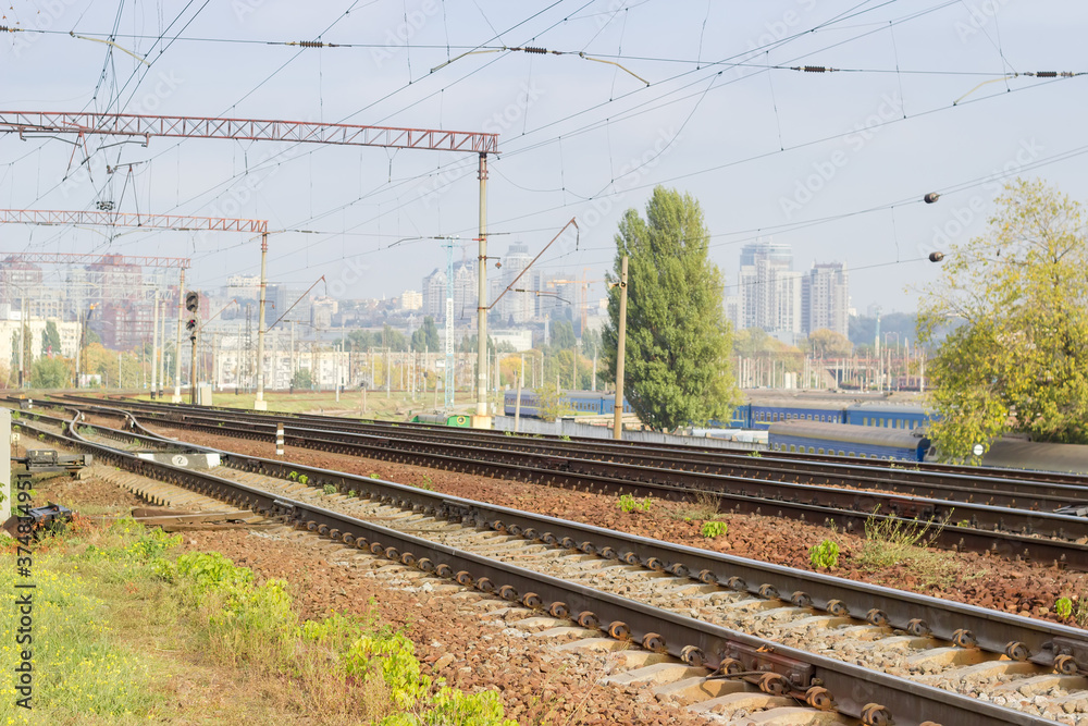 Modern multi-track railway on a background of urban structures Stock ...