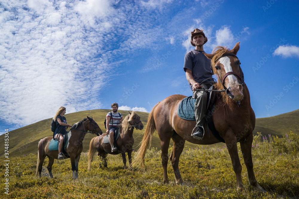 Horseback riding in the Carpathian mountains. Horseback riding in the Carpathian mountains.