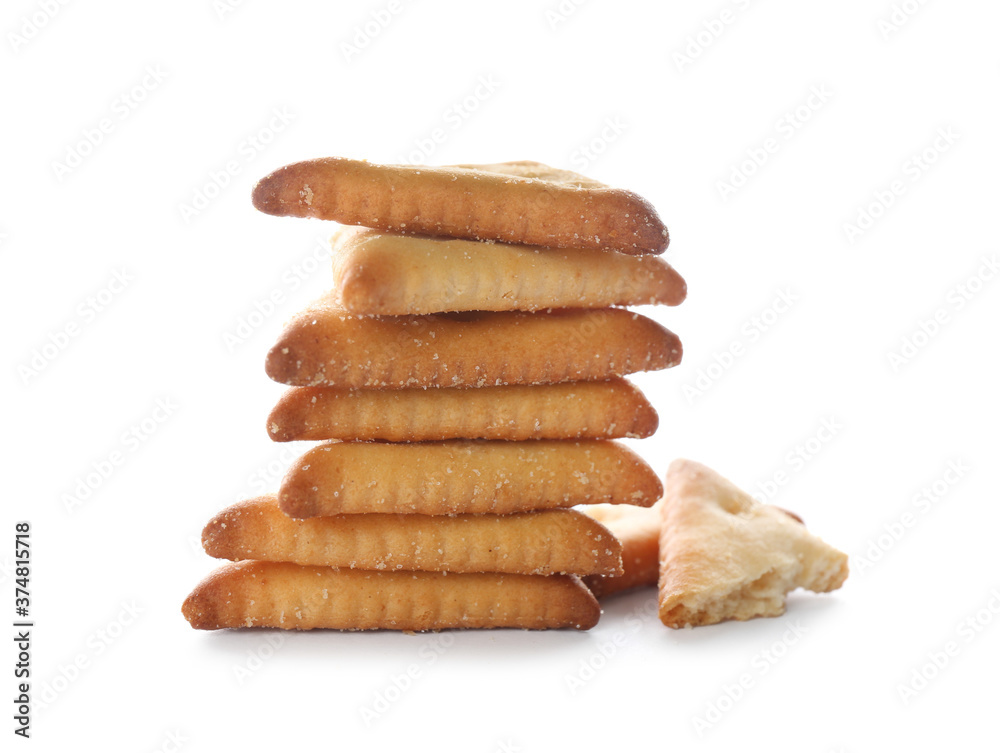 Stack of delicious crispy crackers isolated on white Stack of delicious crispy crackers isolated on white