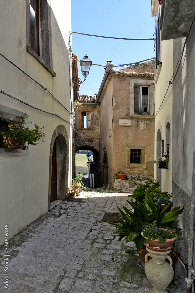 A narrow street among the old houses of Riccia, a medieval village in the Molise region.