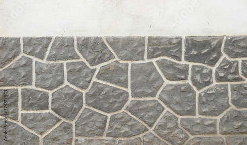 Photos Pared de piedra con formas geométricas