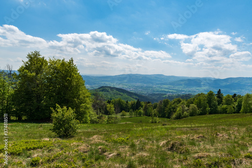 View from meadow bellow Filipka hill summit in springtime Slezske Beskydy mountains in Czech republic