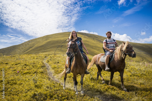 Horseback riding in the Carpathian mountains.