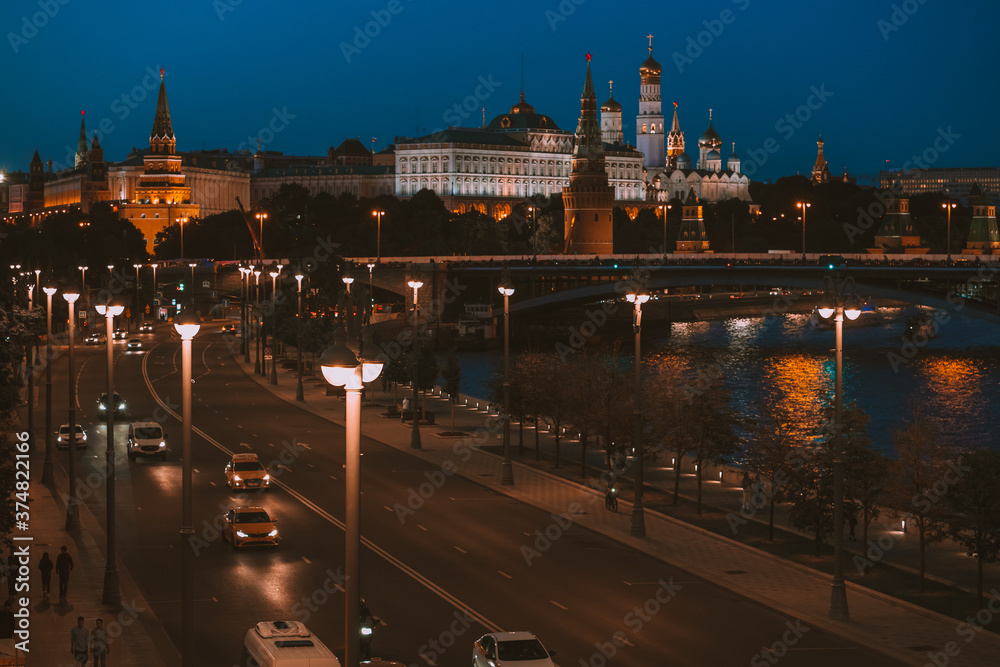 Streets of Moscow at night, night illumination and lights from cars